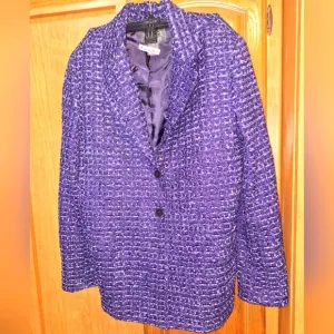 A Lafayette 148 New York dark purple wool blend blazer in a ladies size 12.