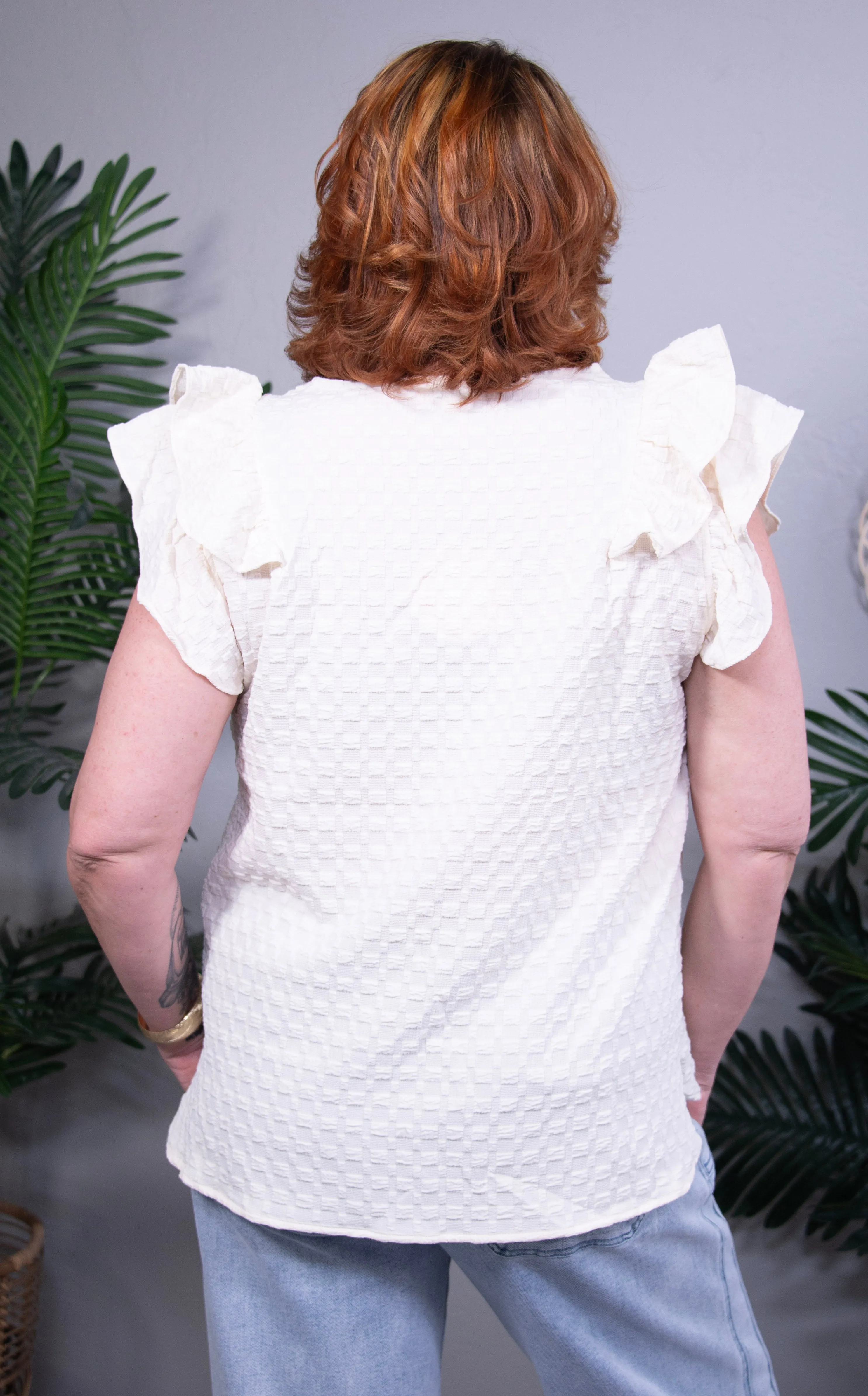 Charm Your Way Textured Jacquard V-Neck Ruffle Cap Top