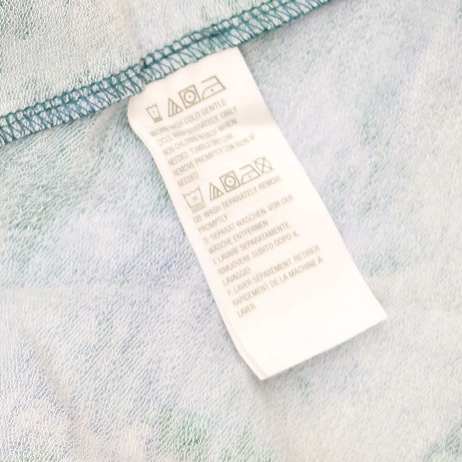 LOGO by Lori Goldstein Women's Woven Hem French Terry Lounge Top