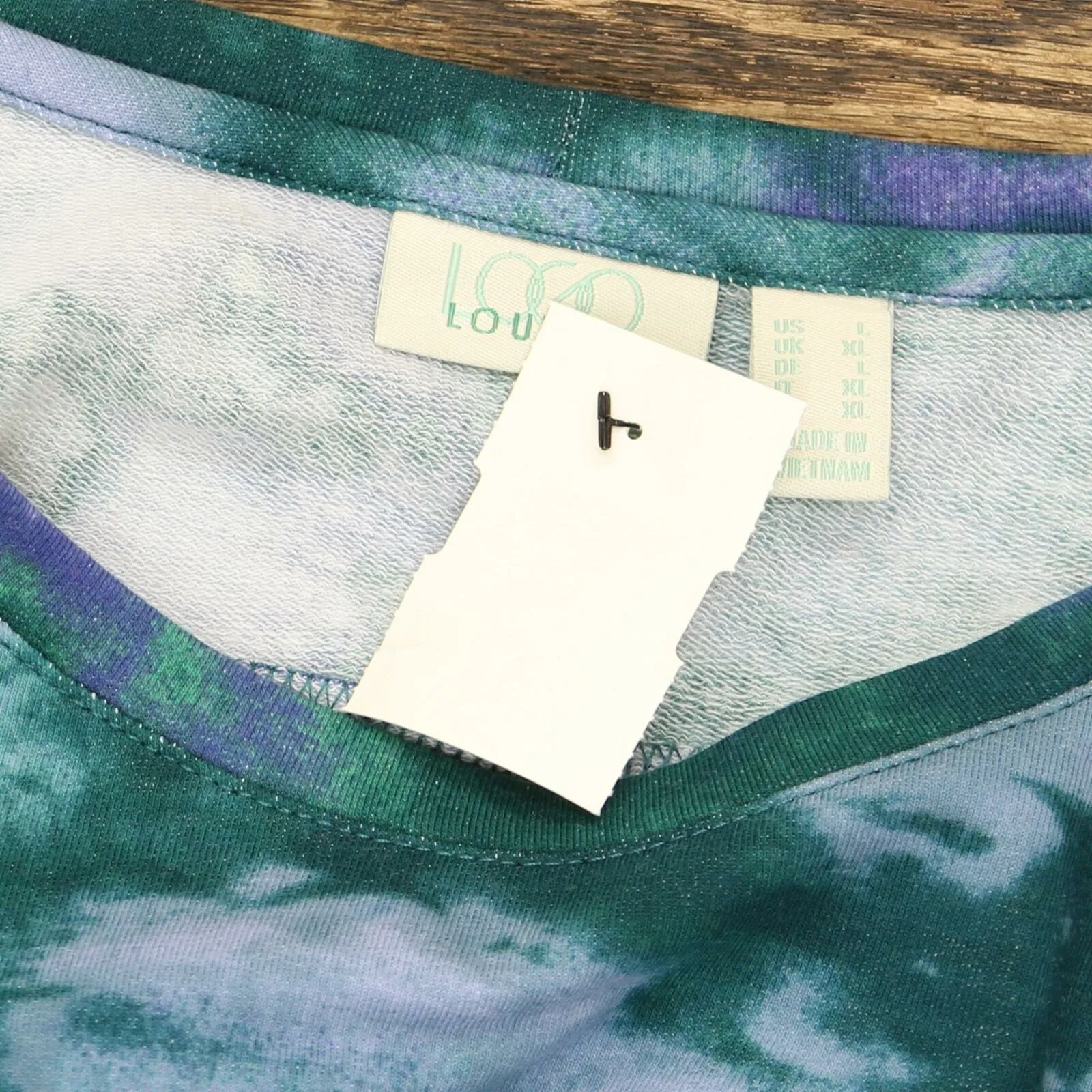 LOGO by Lori Goldstein Women's Woven Hem French Terry Lounge Top