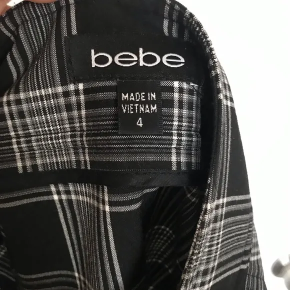 NWOT bebe Asymmetrical Ruffle Mini Skirt Size 4