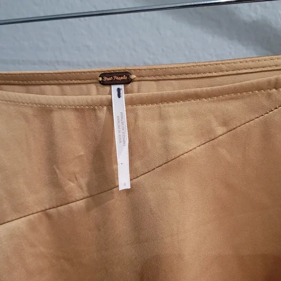 NWOT Free People Slim Shine Asymmetrical Skirt