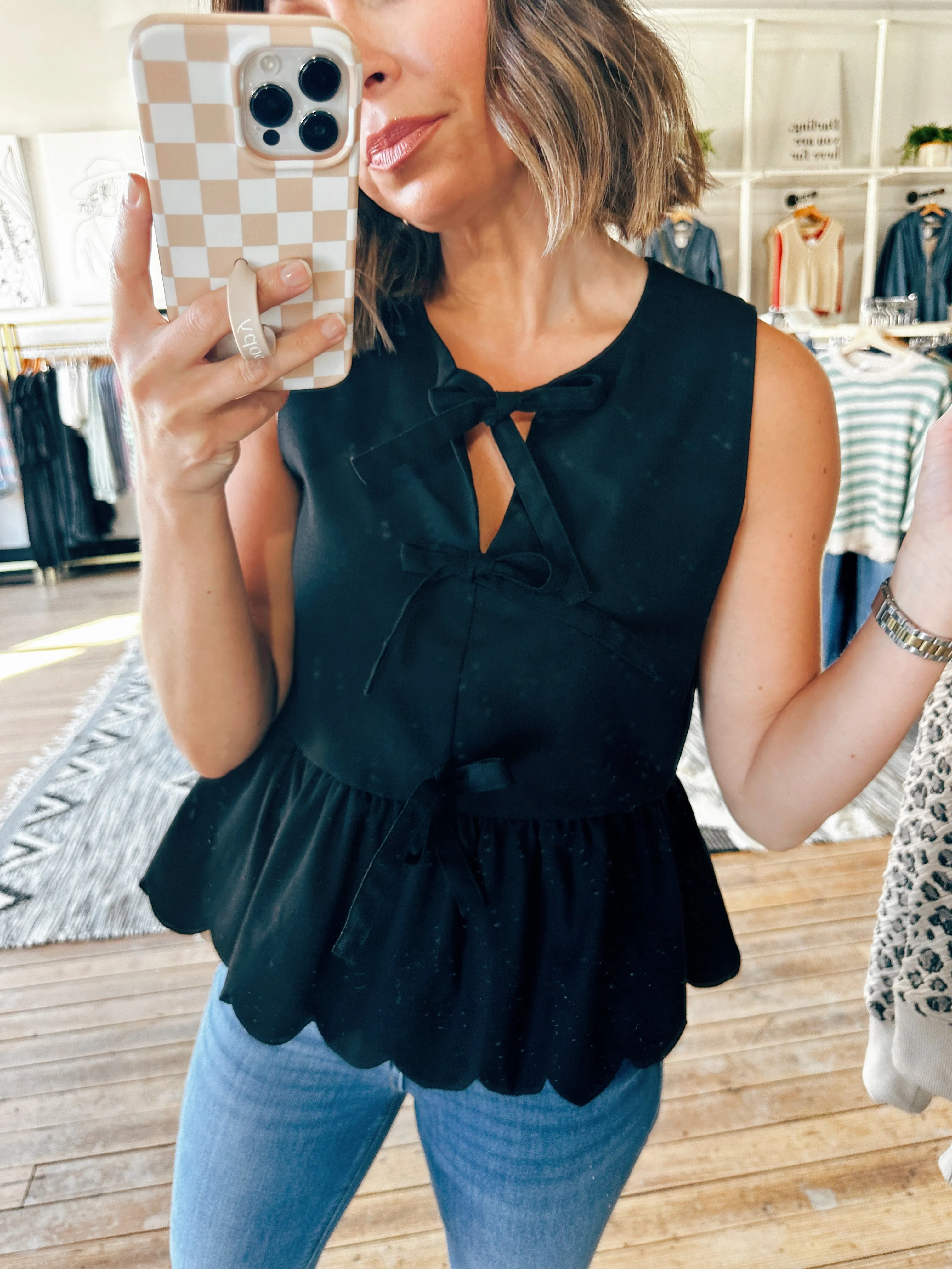 Tulip Ruffled Sleeveless Blouse