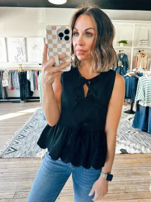 Tulip Ruffled Sleeveless Blouse